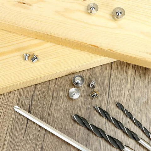 Pro Grade Dowel And Tenon Center Transfer Plugs For Woodworking, 20 Piece Chrome Steel Set on a wooden background with tools