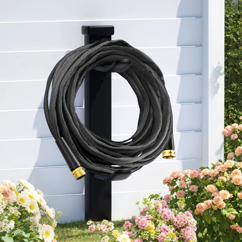 Haeteir 100ft non-expanding garden hose coiled on wall mount, black with brass fittings.