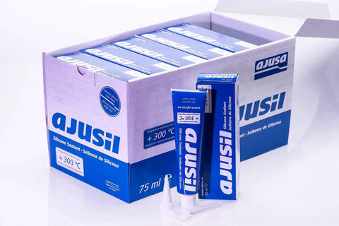 Box of Ajusa silicone gasket maker and sealant for water pumps, oil pans, timing covers, and valve covers with visible tubes.