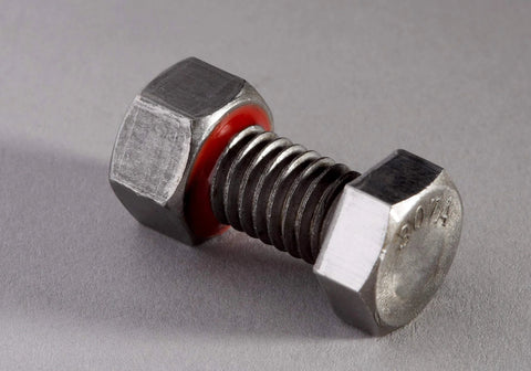 Metal bolt and nut treated with Purple Thread Locker TL71 25125 Adhesive, showing enhanced vibration resistance and sealing.