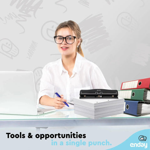 Woman at desk with heavy duty three hole punch for binders, adjustable 10 sheet paper punch, next to binders and paper stack.