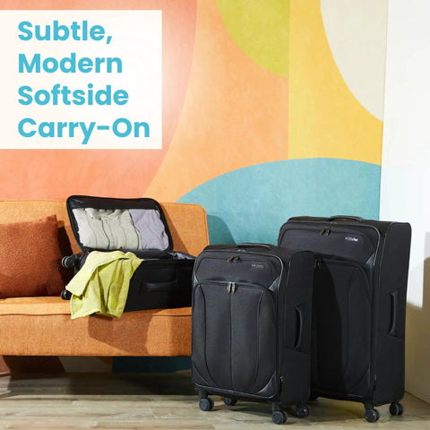 Lightweight 20 Inch Spinner Carry On Luggage With Expandable Softside And Rugged Wheels Next To Sofa, Black, For Quick Getaways
