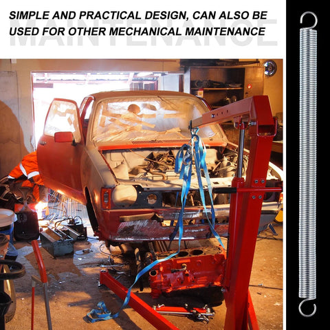 Extension spring, 3/8 x 6-1/2 in, zinc-plated with dual-hook ends, displayed in a car repair shop.