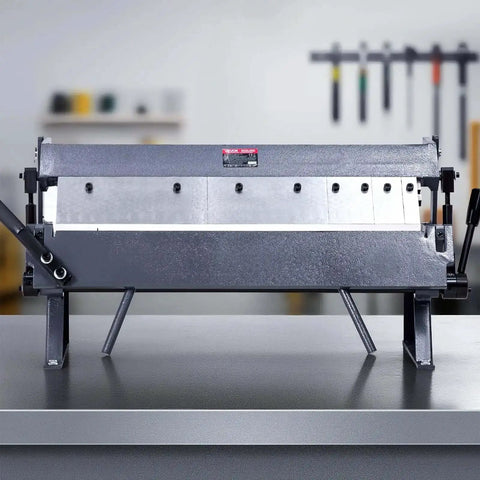 Front view of Box and Pan Brake 24 Inch Sheet Metal Bender, 16-Gauge Mild Steel Capacity, adjustable aluminum folder on workbench.