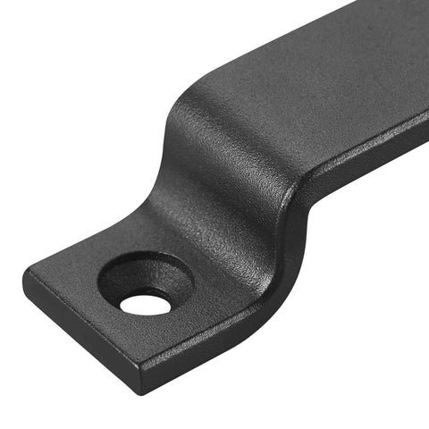 Close-up of matte black carbon steel barn door handle from Black 6.42 Inch Barn Door Handle Set Pack 2 Built Tough for Sliding Doors Cabinets Closets Drawers With Matte Black Finish Carbon Steel Pull Handles and Two Sets of Different Length Screws, showcasing textured finish and mounting hole.