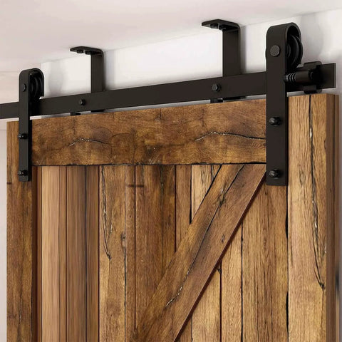 Close-up of 8Ft Ceiling Mount Sliding Barn Door Hardware Kit For 48 Inch Wide Single Wood Door with black finish track and hangers.