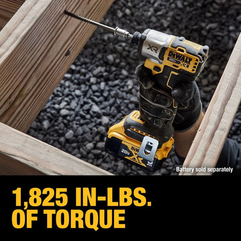 Worker using 20V Max XR Brushless Impact Driver With One Quarter Inch Hex High Torque 3 Speed LED Work Light Extended Runtime Cordless Tool Only 1825 In Lbs Torque And 3400 RPM on wood framing