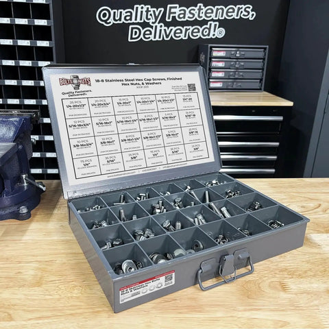 Stainless Steel Hex Cap Screws Bolts Nuts And Washers Assortment Kit 574 Pieces in open steel compartment tray on workbench
