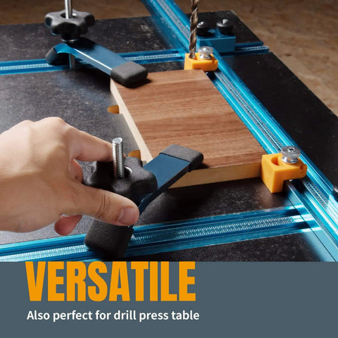 Beefy T Track Hold Down Clamp Set in use on drill press with wood, blue black finish, ergonomic grips, bolts, washers, star knobs