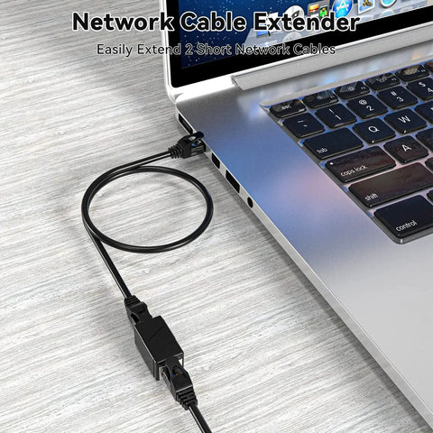 Two Pack Ethernet Couplers To Extend Your Cables Female To Female RJ45 Patch Cable Extenders connected to laptop