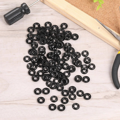 Countersunk cup washers, black #8 stainless steel, 200 pcs on wooden workbench