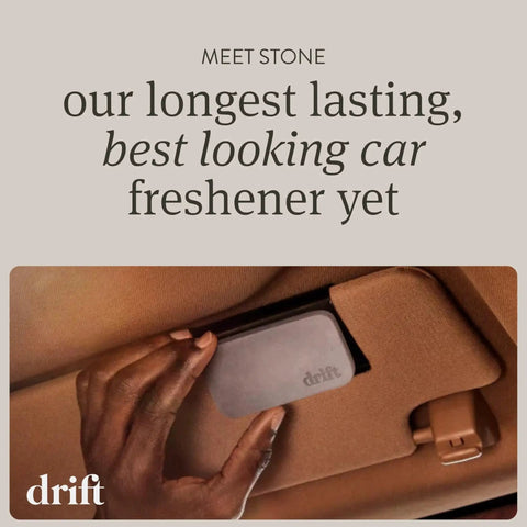 Stone Car Air Freshener With Metal Clip And Cabana Scent Starter Kit installed on car visor
