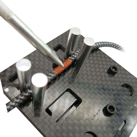 Close-up of Must Have Carbon Fiber Welding Jig Wire Station With Pocket Hole For XT60 XT90 Connectors Soldering Clamp Craft Tool