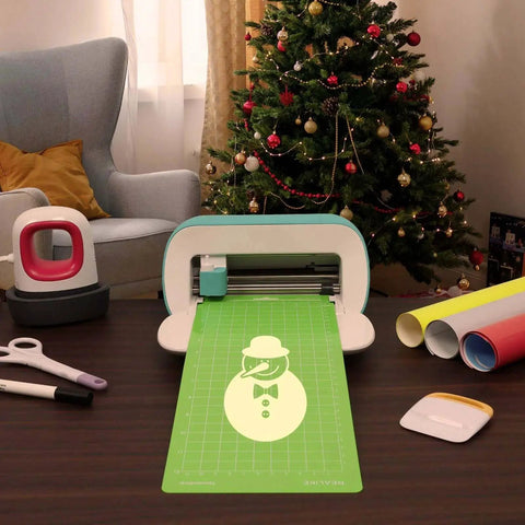 Versatile Cutting Mats For Cricut Joy 4.5 By 12 And 4.5 By 6.5 Inch 6 Pack Including Standard Grip Light Grip And Strong Grip Mats With Adhesive Backing For Joy Accessories And Creative Projects with Christmas tree in background