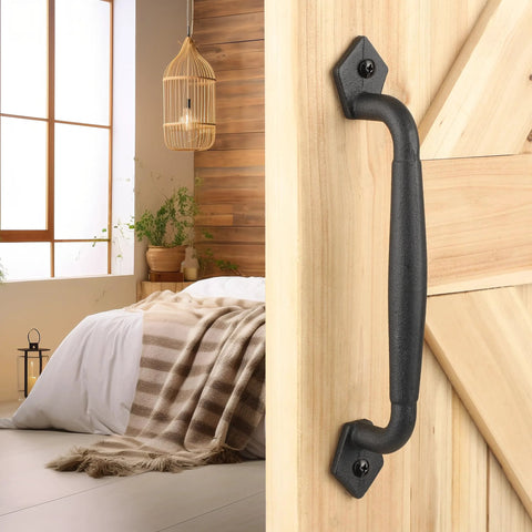 10 Inch Heavy Duty Barn Door Pull Handle Matte Black Solid Metal Sliding Door Hardware For DIY Barn Door Gate Shed Or Garage Large Rustic Round Metal Handle Built To Last installed on a wooden door.