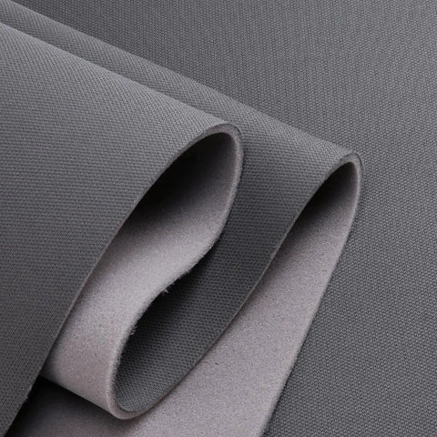 Dark Gray 60 Inch By 76 Inch Mesh Headliner Fabric With Foam Backing For Auto folded to show texture and foam backing.