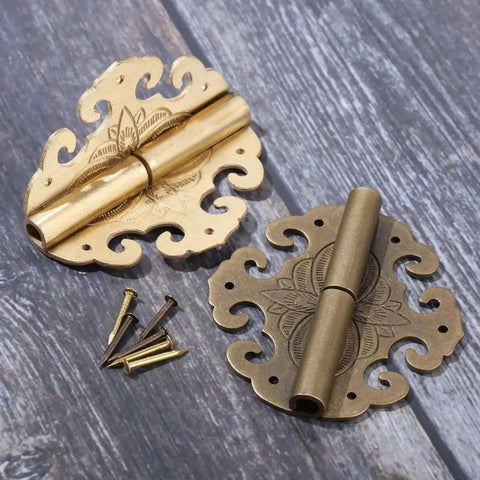 Two Piece Brass Flower Cloud Hinge Set For Jewelry Boxes And Furniture Decor with screws, 60x55mm, shown on wood surface