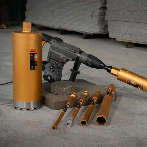 Heavy Duty Wet Core Drill Bit For Concrete And Masonry, Five And A Half Inch Diameter, Sixteen Inch Drilling Depth displayed with drill