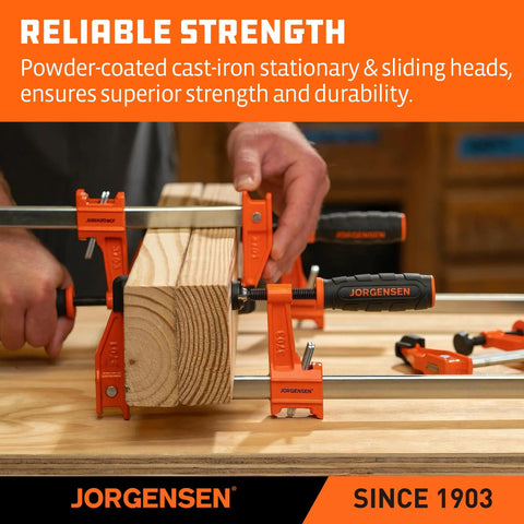 Two orange Jorgensen 24-inch medium-duty steel bar clamps securing a wooden board; 600 lb load.