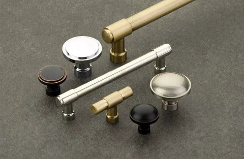 Emtek Jasper 5 Inch Center To Center Bar Cabinet Pull 86688US4 on display with knobs from Industrial Modern Collection on gray background