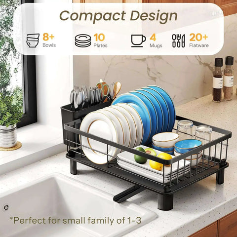 Space Saving Dish Rack For Small Kitchens With Utensil Holder And Drainboard, Angled Drainer In Stainless Steel, Holds Up To 10 Plates And Bowls, Plus Cups, Compact 15 L X 11 W X 5.9 H Black Finish shown on countertop next to sink.