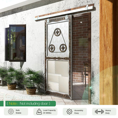 Exterior Sliding Barn Door Hardware Kit With 12 Ft Galvanized Steel Box Track, installed on outdoor wall with plants