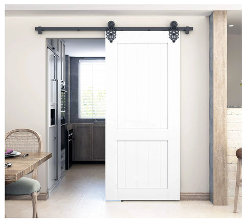 Ornate Black Iron Sliding Barn Door Hardware Kit For Single Door With 5.5 Foot Track installed in kitchen entrance