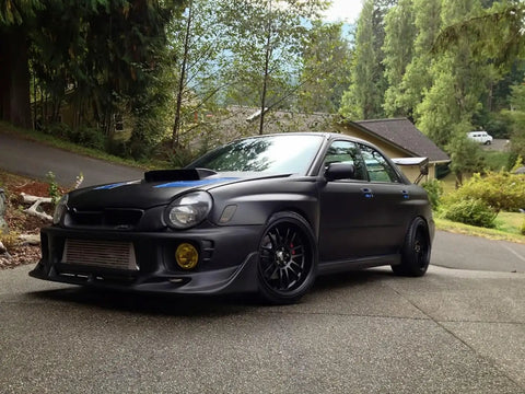 Matte Black Vinyl Wrap Roll With XPO Air Release Technology For DIYers 1Ft By 5Ft Durable Lightweight Film For Easy Wrapping And Paint Alternative From VViViD Vinyls installed on a modified car.