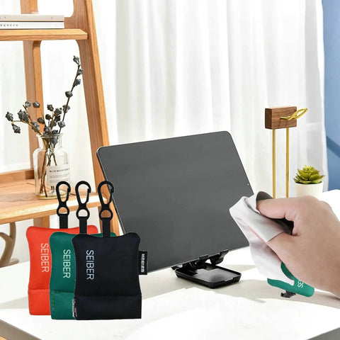 Person using 7x7 Inch Microfiber Glasses Cleaning Cloth With Neoprene Pouch on tablet screen, with pouches in background, 3 pack