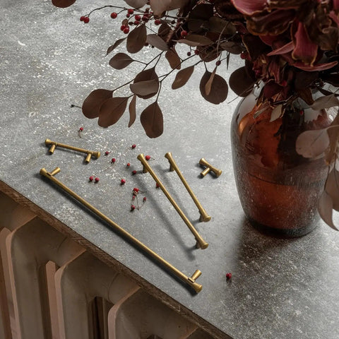 Antique Brass Cabinet Handles 3 Inch Center to Center Rustic Drawer Pulls For Kitchen And Bedroom 6 Pack Model 6652 on table
