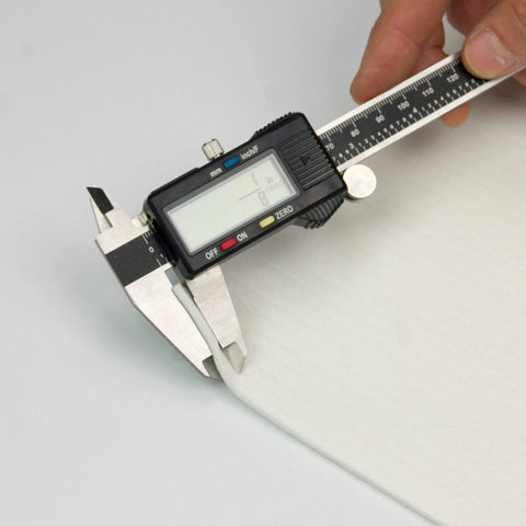 High-temperature gasket paper sheet measured by digital caliper, 1/8 in thick for stoves