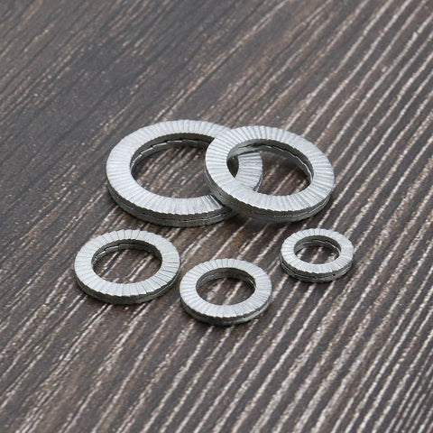 Five manganese steel wedge lock washers, assorted sizes (M8–M20).