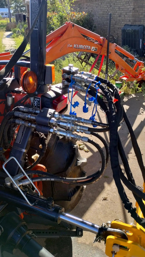 Manual 6 Port Tractor Remote Diverter Valve Converts One Remote Into Two Inlets And Four Outlets with mounting bracket on tractor