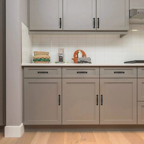 30 Pack Solid 3 Inch Cabinet Handles Matte Black Zinc Alloy Pulls for Kitchen Cupboards and Drawers, installed on grey cabinets