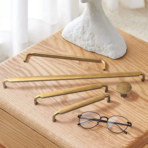 5 Inch Hole Center Antique Brass Cabinet Pulls Zinc Alloy Kitchen Drawer Pulls 6 Pack Vintage Retro Brass Handles on wooden table