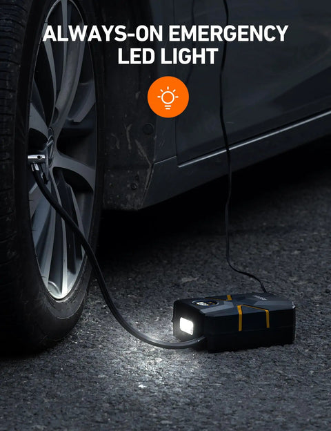 Portable Tire Inflator With Digital Display And Auto Shutoff 12V DC Car Air Pump 150 PSI on the ground beside a car tire.