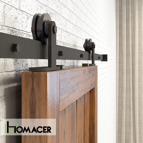Black Rustic Non Bypass Sliding Barn Door Hardware Kit For One Door Six Foot Flat Track T Style Rollers Heavy Duty Track System For Interior And Exterior Use Built Tough With Durable Nylon Wheels installed side view