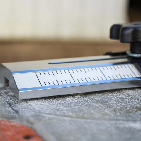 Close-up of Pro Grade Thin Rip Table Saw Jig Guide for Router and Band Saw, showing precision markings and durable design.