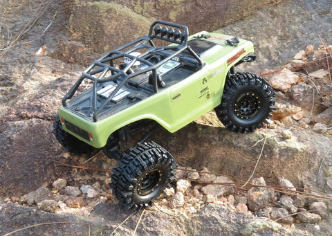 RC car with 1.0 Crawler Tires 58mm Tall 1.0 Inch Mud Slingers Soft Sticky Compound on rocky terrain