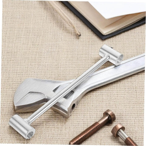 Adjustable Hinge Wrench For Door Gaps Pro Grade Heavy Duty Tool Kit displayed on a workbench with bolts and a wrench