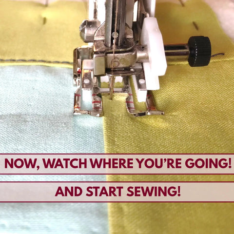 Madam Sew open-toe walking foot attached to a sewing machine, quilting through layered blue and lime fabric.