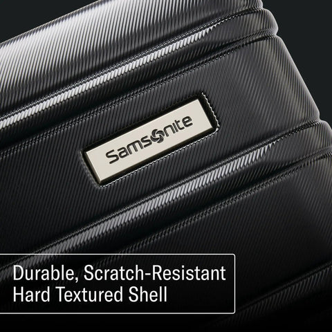 Close-up of the textured shell of Omni 2 24 Inch Medium Checked Hardside Luggage With 360 Degree Spinner Wheels By Samsonite.