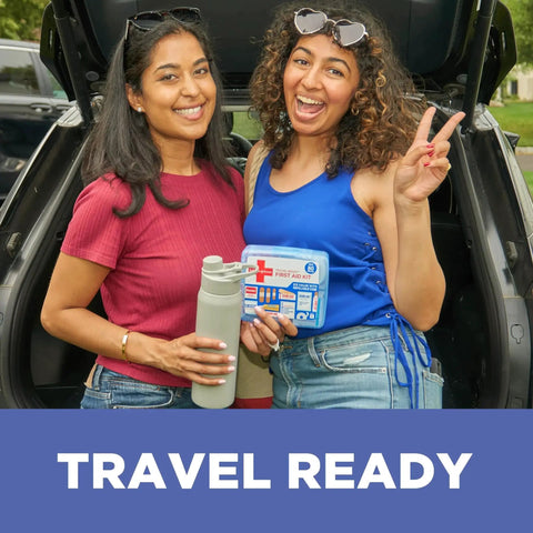 Two people holding a Travel Ready 80-Piece First Aid Kit For Home Car Travel Camping Essentials With Band-Aid Brand Wound Care.