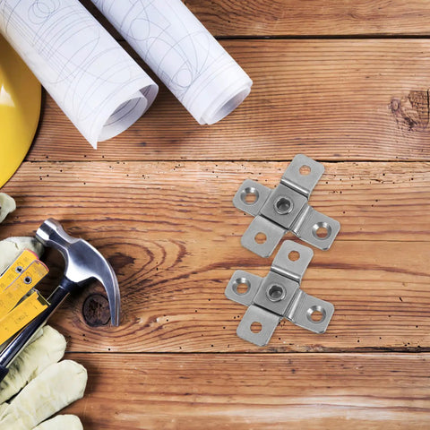 Overhead view of Stainless Steel Two Pack Torque Shaft Hinges With Friction Pivot For Cabinets And Furniture Doors on wooden surface