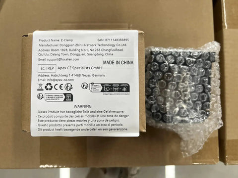 Packaged 65mm Aluminum CNC Spindle Holder Z Clamp with specifications and safety information on the box.