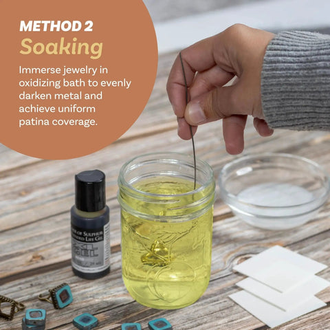 Demonstrating Extended Life Liver Of Sulfur Gel For Patina Finishes On Silver Copper Bronze Jewelry And Metal Art Projects 1 Fluid Ounce Bottle Creates Blue Green Or Brown Oxidized Patina For Jewelry Craft And Metalworking in a soaking method with jewelry in a glass jar.