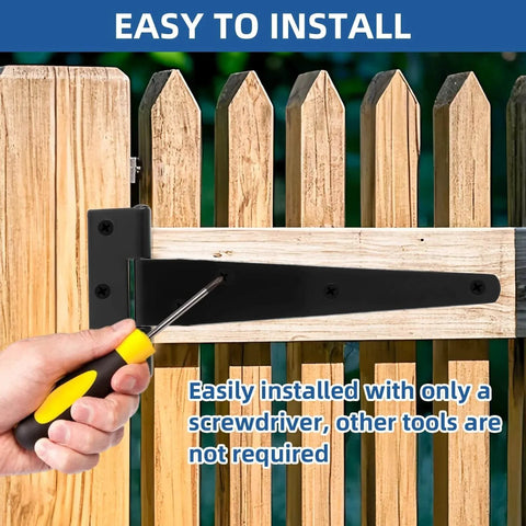 Installing T Strap Barn Door Hinges Heavy Duty 5 Inch Black Iron Gate Straps on a wooden fence with a screwdriver.