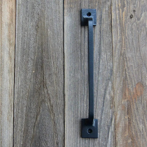 Black Cast Iron Pull Handles 9 Inch Square Base Set Of 2 Durable Powder Coated Finish For Cabinet Doors Gates Barn Doors And Interior Exterior Use Rustic Farmhouse Style Hardware Suitable For Indoor And Outdoor Use mounted on wood door.