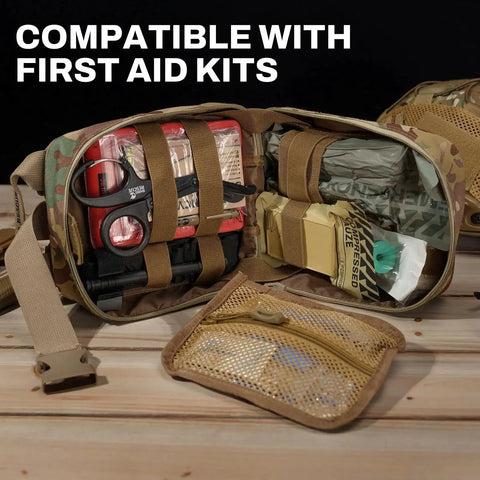 Open first aid kit with Sterile Compressed Gauze For Emergency Wound Dressing And Trauma Kit 6 Pack, scissors, and tools, showing compatibility for emergency use.