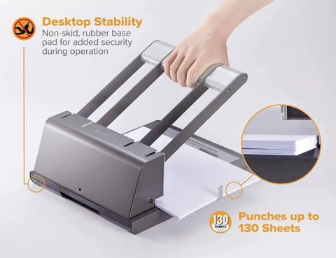 Extreme Duty Two To Three Hole Punch With High Leverage Handle punching paper, showing desktop stability and 130-sheet capacity.